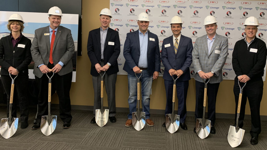Lineage Logistics, JBS USA and OmniTRAX have teamed on a new cold-storage facility project in Windsor, Colo. OmniTRAX will be designing, building and operating “a custom intermodal rail solution” for the facility, which is slated to open in 2023. (Among the officials pictured is OmniTRAX CEO Dean Piacente, third from right.)