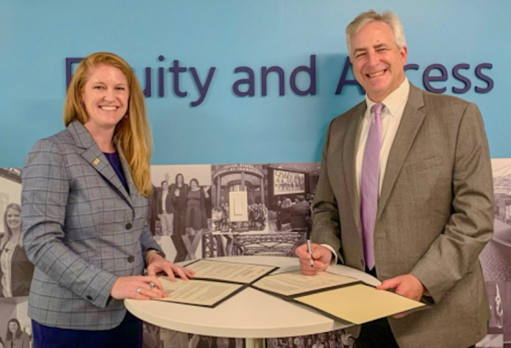 WTS International President and CEO Sara M. Stickler (left) and Eno President and CEO Robert Puentes (right) sign a formal MOU on Sept. 8.