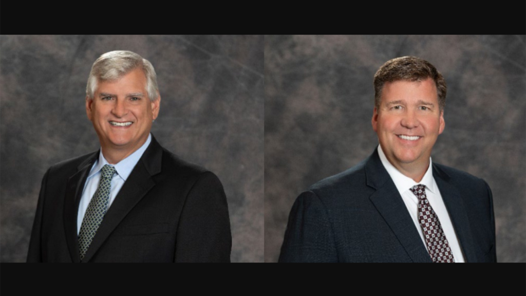 Loram’s outgoing CEO Phil Homan (left) and incoming CEO Bradley Willems.