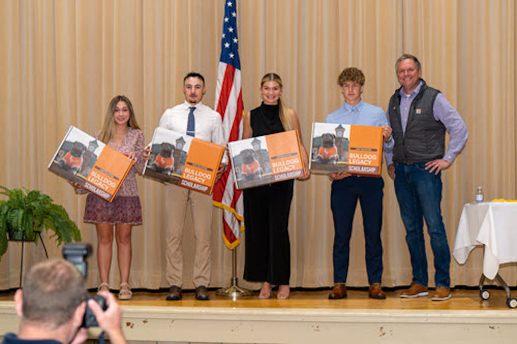 Four East Palestine High School students receive scholarships for higher education.