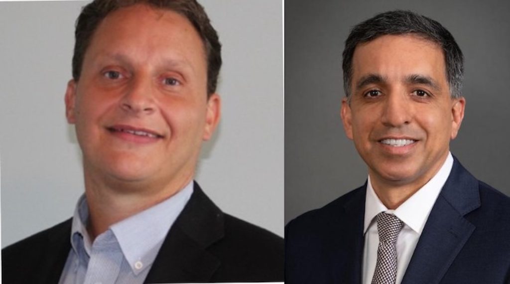 Nicholas J. Randall, COO, FreightCar America (left); and Rahul Jalali, Executive Vice President, UP (right).