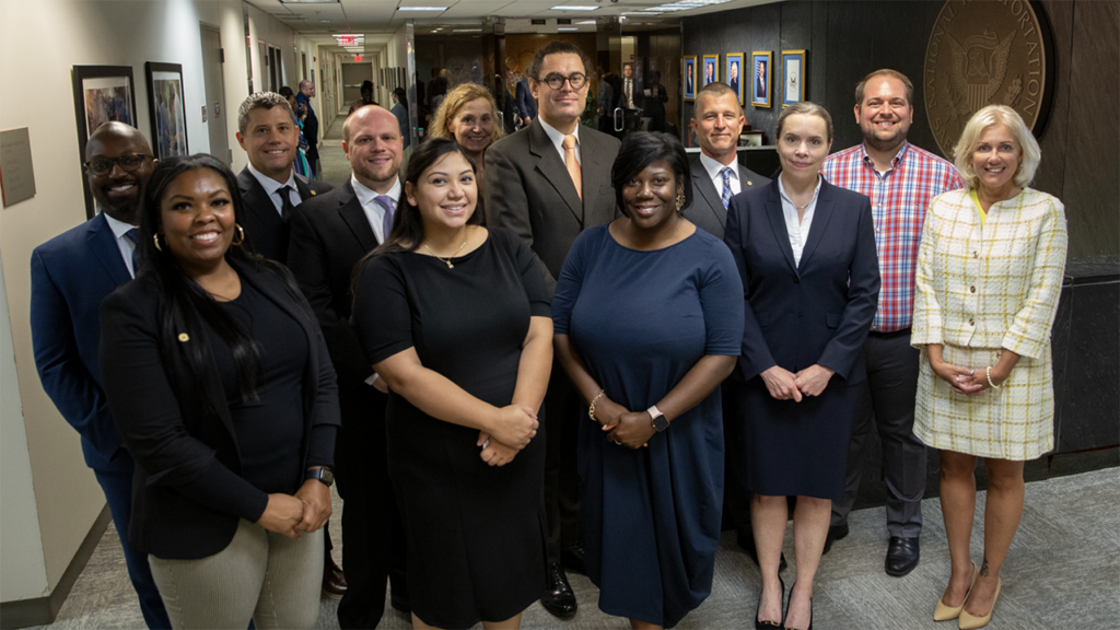 NTSB Chair Jennifer Homendy (right) with some of the 15 new employees sworn in on Sept. 25. The agency now has 433 staffers. (Caption and Photograph Courtesy of NTSB)