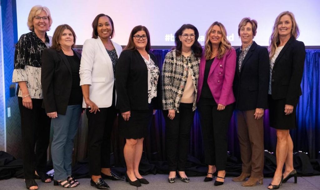 Past LEAD presidents attending the conference included, from left, Lori Loschen, general director, Marketing and Sales; Carrie Powers, assistant vice president-Financial Reporting, and current LEAD president; Polly Harris, vice president-Human Resources; Jill Bazzell Stenstrom, general director-Real Estate; Beth Whited, president; Beth Steele, general director, Marketing and Sales; Jennifer Hamann, executive vice president-Finance and chief financial officer; and Jennifer Sedlacek, senior director-Engineering Capital Budget.