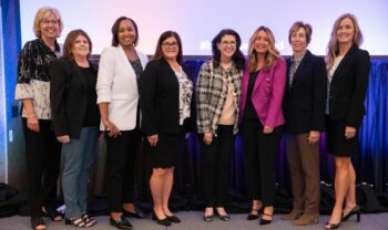 Past LEAD presidents attending the conference included, from left, Lori Loschen, general director, Marketing and Sales; Carrie Powers, assistant vice president-Financial Reporting, and current LEAD president; Polly Harris, vice president-Human Resources; Jill Bazzell Stenstrom, general director-Real Estate; Beth Whited, president; Beth Steele, general director, Marketing and Sales; Jennifer Hamann, executive vice president-Finance and chief financial officer; and Jennifer Sedlacek, senior director-Engineering Capital Budget.