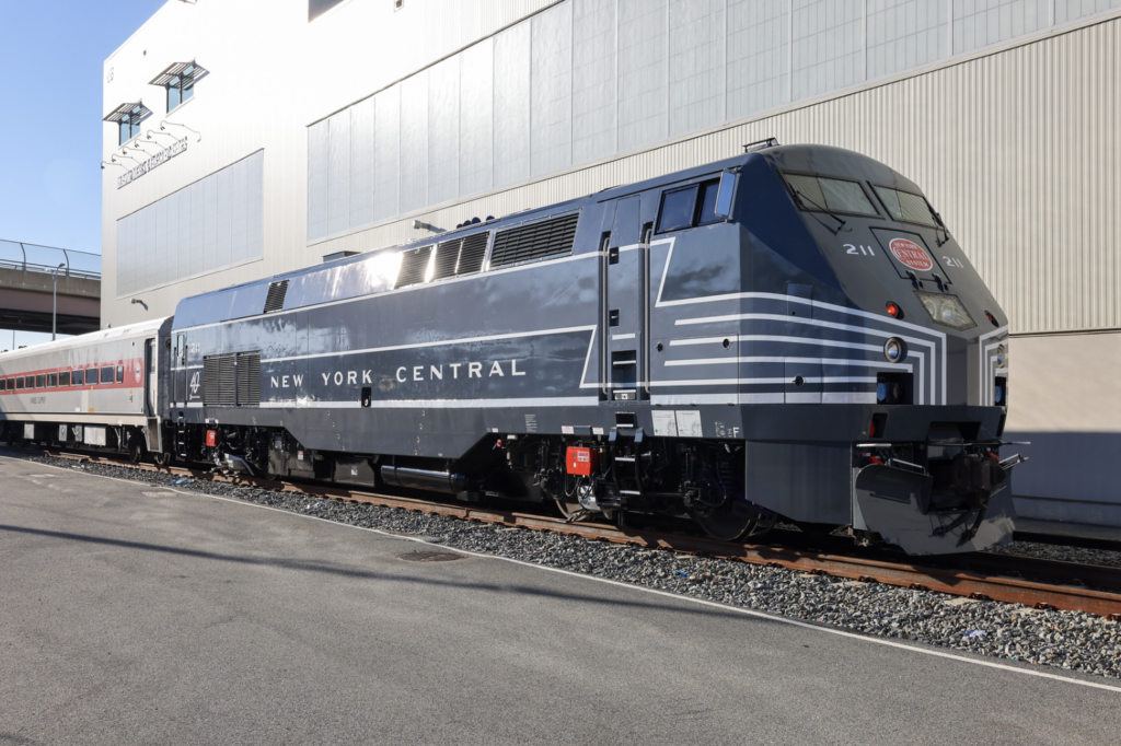 Craftsmen at MTA Metro-North Railroad’s North White Plains, N.Y., shop applied a vinyl wrap to locomotive No. 211, celebrating New York Central, the predecessor railroad that operated on the Hudson and Harlem lines. (Photo credit: Emily Moser / MTA Metro-North Railroad)