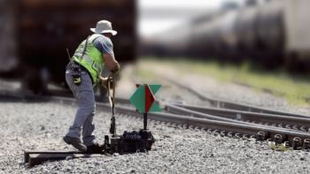 Part of a systemwide standardization initiative, new green-red switch targets indicate to operators when trains will be guided—or switched—from one track to another. (Caption and Photograph Courtesy of UP)