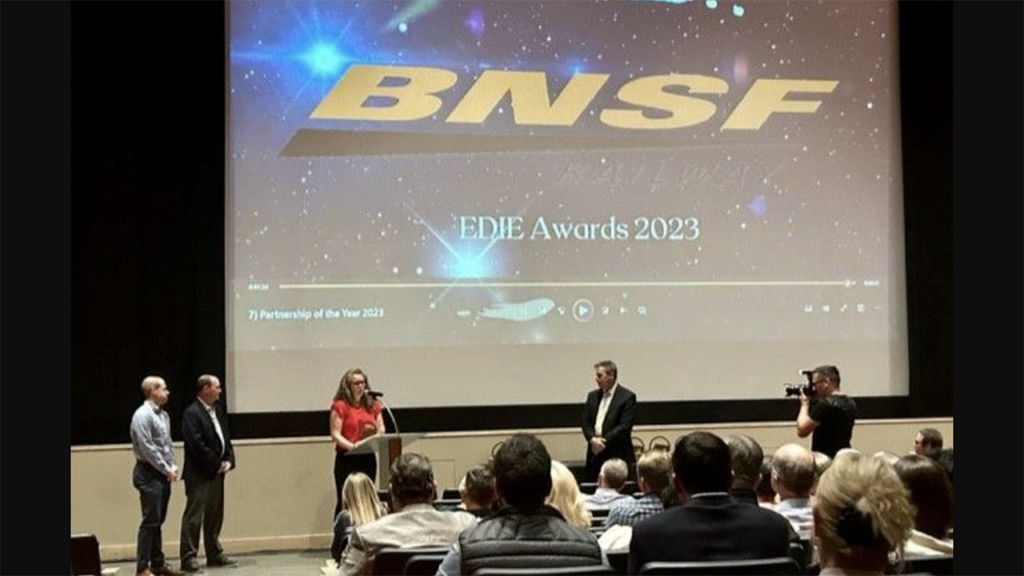 Accepting BNSF’s Partnership of the Year Award from the Economic Development Council of Colorado were Lindsay Van Meter BNSF Regional Manager, Economic Development; David Polzin BNSF Director, Economic Development; and Ryan Dwiggins, JLL Manager, Economic Development. (BNSF Photograph)