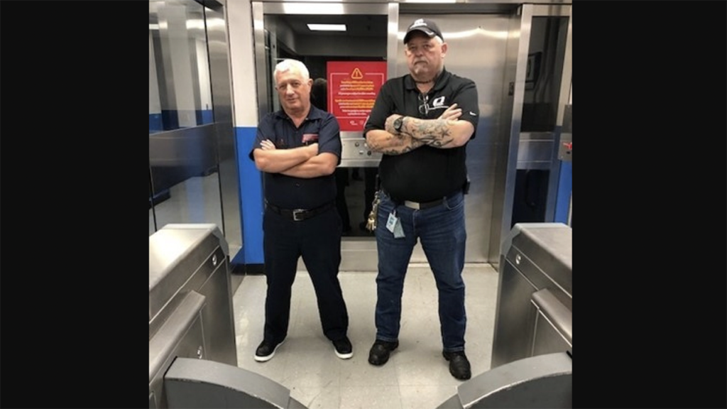 Eugene Shnayderman (left) and PATH Chief Maintenance Supervisor Charles Chipman standing guard. (PANY/NJ Photograph)