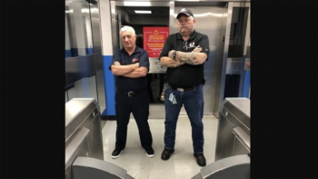 Eugene Shnayderman (left) and PATH Chief Maintenance Supervisor Charles Chipman standing guard. (PANY/NJ Photograph)
