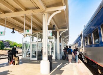 Passengers wait to board a Piedmont train at the station in Greensboro N.C. (NC By Train)