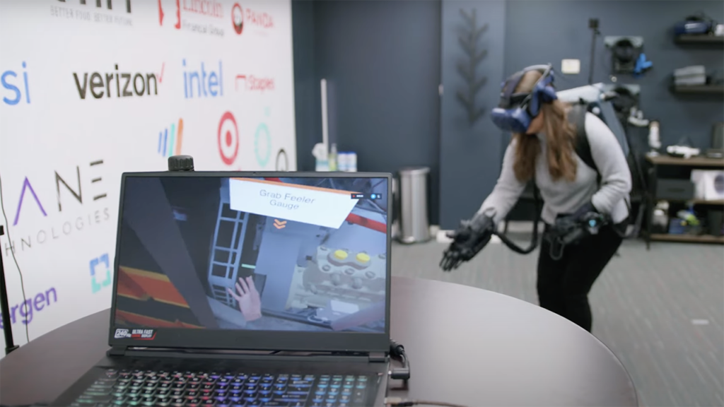 Pictured: A BNSF student using virtual reality to learn how to adjust the gear lash on a high-pressure fuel pump. (Screen Grab from BNSF video)