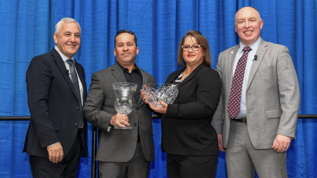The Union Pacific 2023 J.C. Kenefick Safety Award winner Bayson Oxuzidis with, from left, Chief Executive Officer Jim Vena; Bayson’s wife, Jennifer; and Eric Gehringer, Executive Vice President-Operations. (UP Photograph)