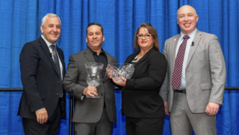 The Union Pacific 2023 J.C. Kenefick Safety Award winner Bayson Oxuzidis with, from left, Chief Executive Officer Jim Vena; Bayson’s wife, Jennifer; and Eric Gehringer, Executive Vice President-Operations. (UP Photograph)