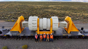 Atlas (pictured) is a 12-axle U.S. Department of Energy-designed railcar for transporting shipments of spent nuclear fuel weighing up to 480,000 pounds (240 tons). The $33 million project took 10 years to complete. (DOE Photograph)