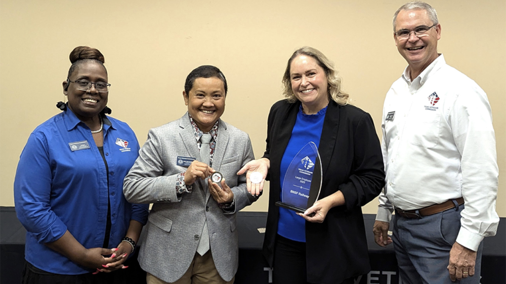 “We’re proud to be recognized by the Texas Veterans Commission [TVC] with its ‘Large Employer of the Year’ award!” BNSF reported Aug. 16 via social media. Pictured, from left to right: TVC District Manager Jo Ikard, TVC Veteran Employee Liaison Jay Zimmerman, BNSF Director of Talent Acquisition Kelly Jimenez and TVC Division Director Charlie Catoe at the TVC awards ceremony Aug. 9 in Humble, Tex. (BNSF Photograph)