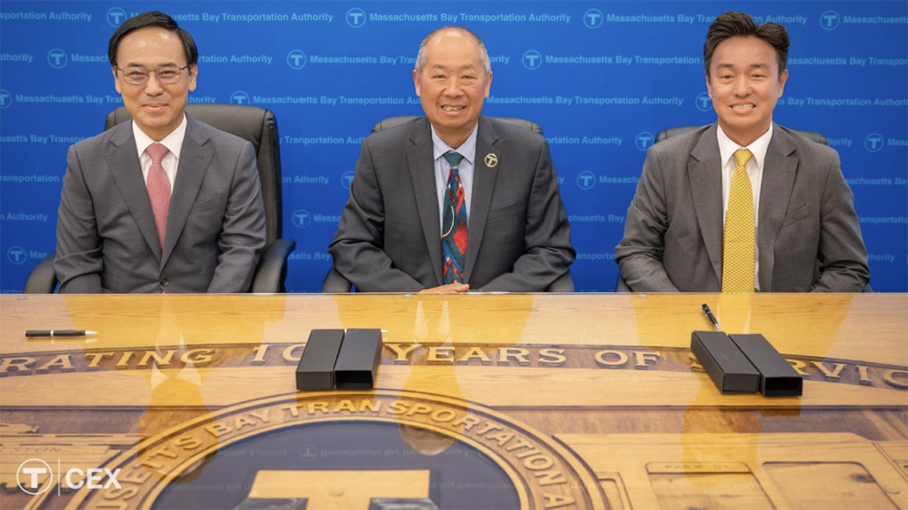 MBTA CEO and General Manager Phillip Eng (center) on Aug. 14 signed an agreement with Hyundai Rotem CEO Yong Bae Lee (left) and Hyundai Rotem USA President Steve (Sung Hoon) Kang for 41 more Commuter Rail cars. (MBTA Photograph)
