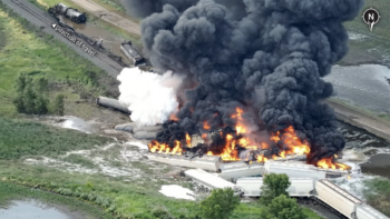 Aerial view of derailment site. (Foster County Emergency Management Photograph, Courtesy of NTSB)
