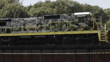“Today, we are excited to share this video which introduces our new locomotive design scheme honoring veterans and service members, and showcases several of the many veterans who work for G&W,” G&W posted on Facebook and LinkedIn on Veterans Day. (Screenshot of Providence & Worcester 4069 from G&W Video)