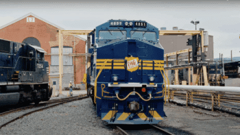 Norfolk Southern’s team at the Juniata Locomotive Paint Shop in Altoona, Pa., brought predecessor railroad TAG “back to life.” (Screen grab from NS video)