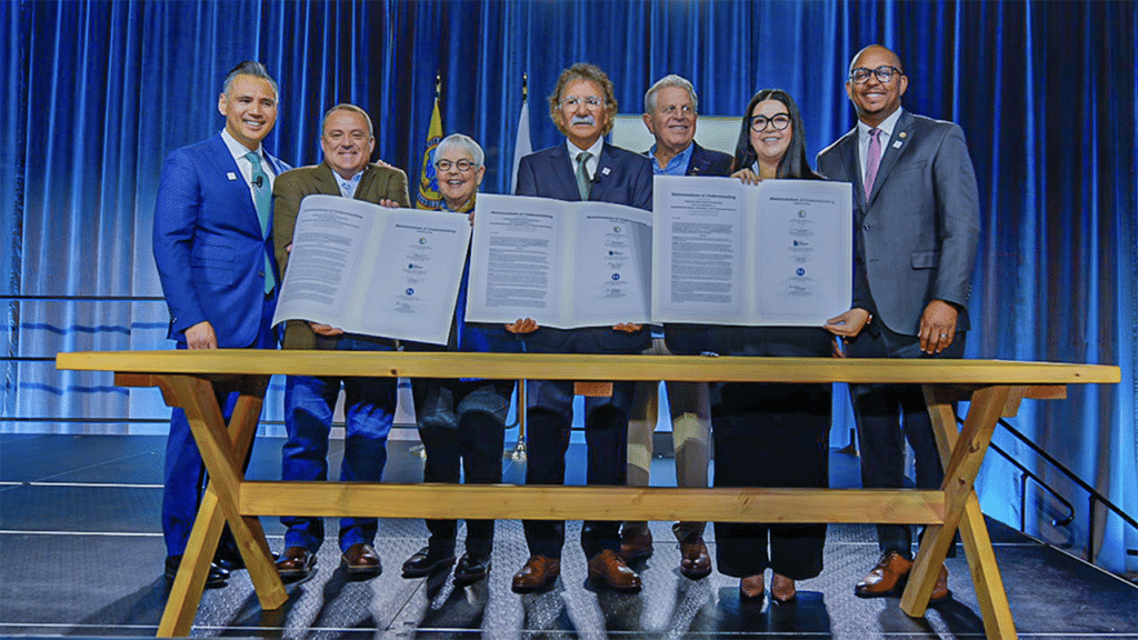 At the conclusion of POLB’s State of the Port address earlier this month, officials signed a memorandum of understanding to collaborate on offshore wind power projects. Pictured, from left to right: Port of Long Beach COO Dr. Noel Hacegaba, Port of Humboldt Bay Executive Director Chris Mikkelsen, Long Beach Harbor Commission President Bonnie Lowenthal, Port of Long Beach CEO Mario Cordero, Long Beach Harbor Commission Vice President Frank Colonna, State Lands Commission Senior Mineral Resources Engineer Vanessa Perez, and Long Beach Mayor Rex Richardson. (POLB Photograph)