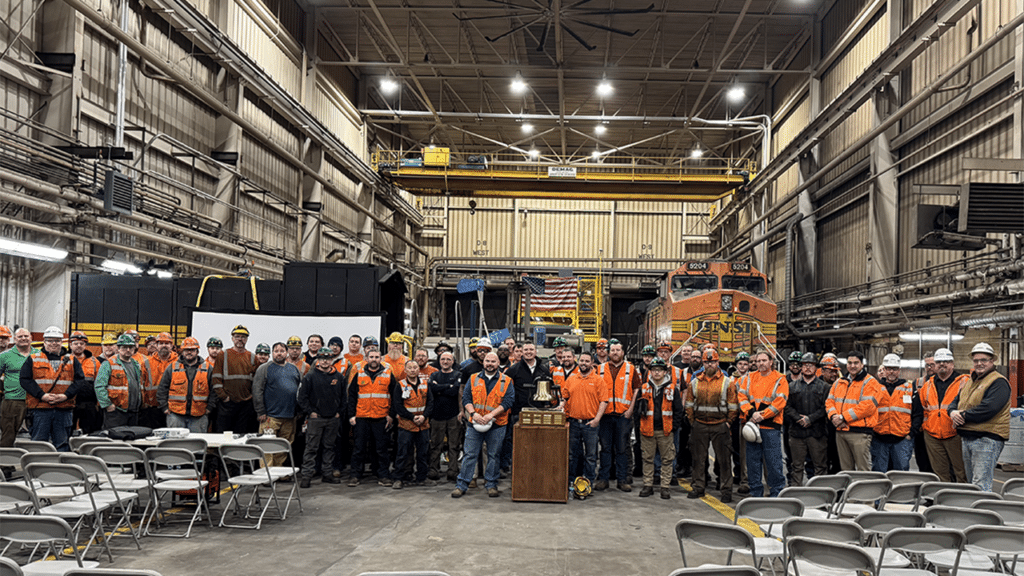 Members at BNSF’s Minneapolis Northtown shop celebrate their Safety Bell achievement. (Caption and Photograph Courtesy of BNSF)