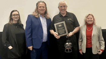 OLI Board Chair and ASLRRA SVP, Safety, Regulatory, and Environmental Policy Jo Strang (far right) pictured with F. Tom Roberts Memorial Volunteer Award honoree Bob Crawford (center). They are joined by Jessica Devorsky, Texas Operation Lifesaver State Coordinator and F. Tom Roberts Award Committee Chair (far left), and Mark Sexton, Oklahoma Operation Lifesaver State Coordinator. (OLI Photograph)