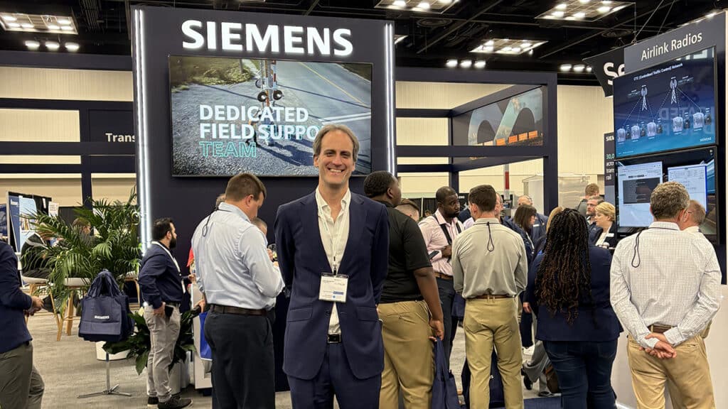 Alvaro Senador-Gomez (center) is Siemens Mobility’s new President of Rail Infrastructure in North America. He joins his team at Railway Interchange in Indianapolis to showcase the company’s latest technology. (Photograph by Marybeth Luczak)