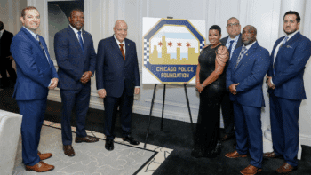 During the True Blue gala on Nov. 14, Herbert Smith (left), NS Regional Vice President of Government Relations, awarded a grant to the Chicago Police Foundation. Standing next to Smith are CPD Superintendent Larry Snelling and Chicago Police Foundation Chairman Rick Simon. (Caption and Photograph Courtesy of NS)