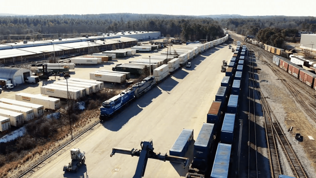 NS on Jan. 22 reported via Facebook: “Chicago [to] New England, now 10 hours faster. East Edge is our newest double-stack intermodal service, replacing a slower, single-stack operation with a modern, high-efficiency connection between Chicago and Ayer, Mass. Built for faster transit times, added capacity, and long-term growth for our customers. Did you catch the first train last week? Our D&H and Conrail heritage units led the way—history pulling the future forward!” (Screen Grab from NS Video)